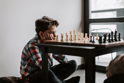 A little boy is trying to challenge his brain 