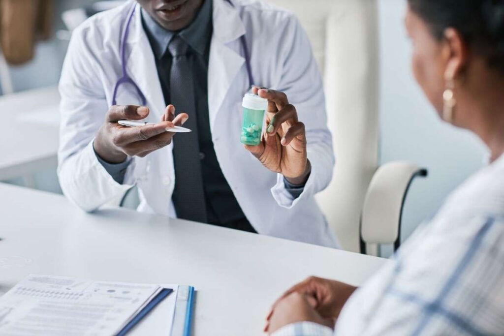 psychiatrist explaining how medication management supports your treatment during a patient consultation.